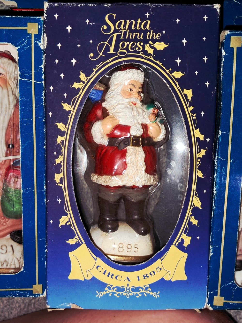 Santa Thru the Ages Figurine
